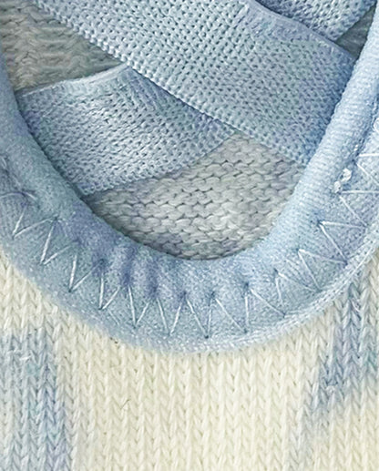 Close-up of the light blue cloud-wash fabric and neat zigzag stitching detail around the opening of the Full Toe Cloud Wash Low Rise Grip Socks.