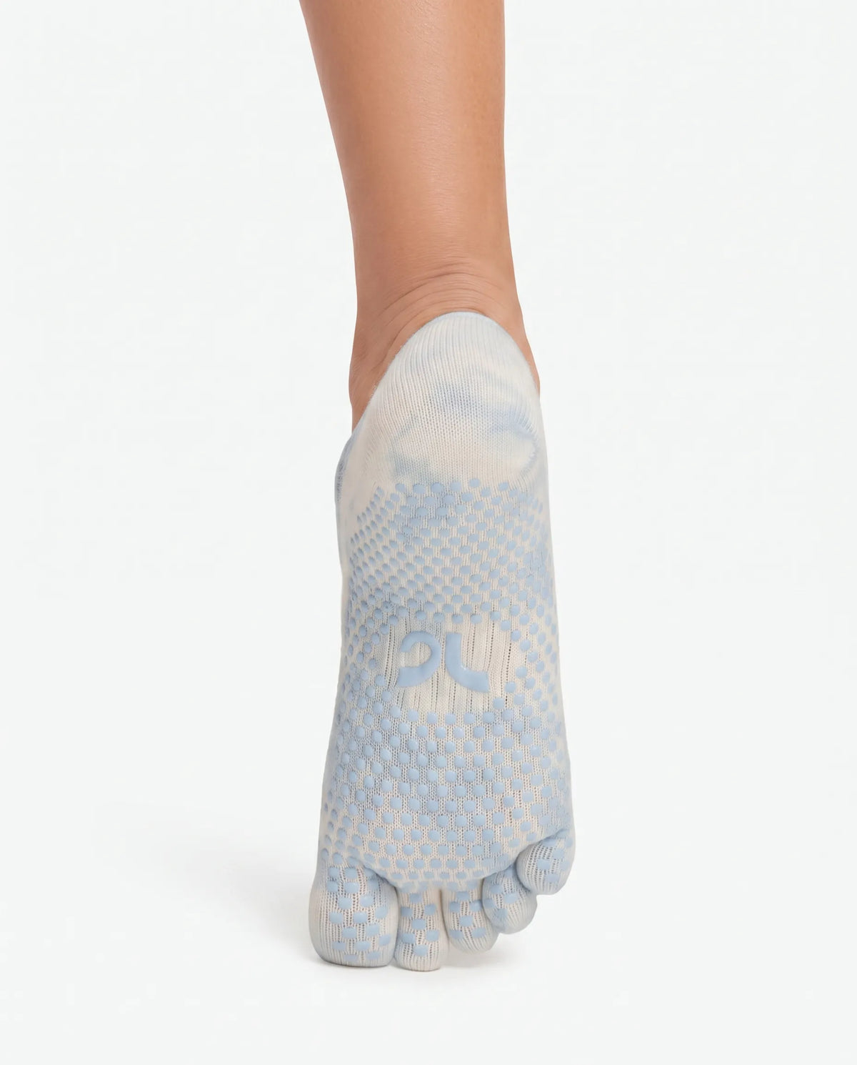 Bottom view of the Full Toe Cloud Wash Low Rise Grip Socks showing the full-coverage non-slip silicone grip dots and individual toe pockets designed for Pilates and yoga.