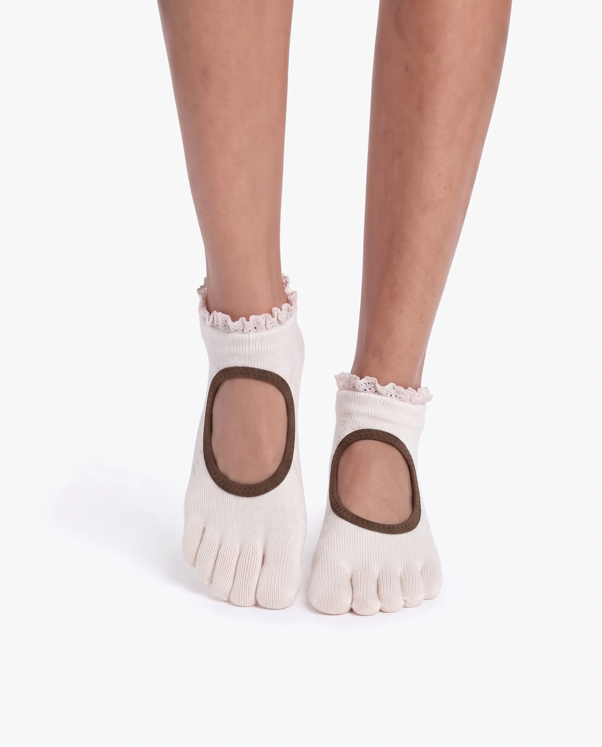Front view of model wearing Yanng's Full Toe Ruffle Open-Vamp Low Rise Grip Socks on a white studio background