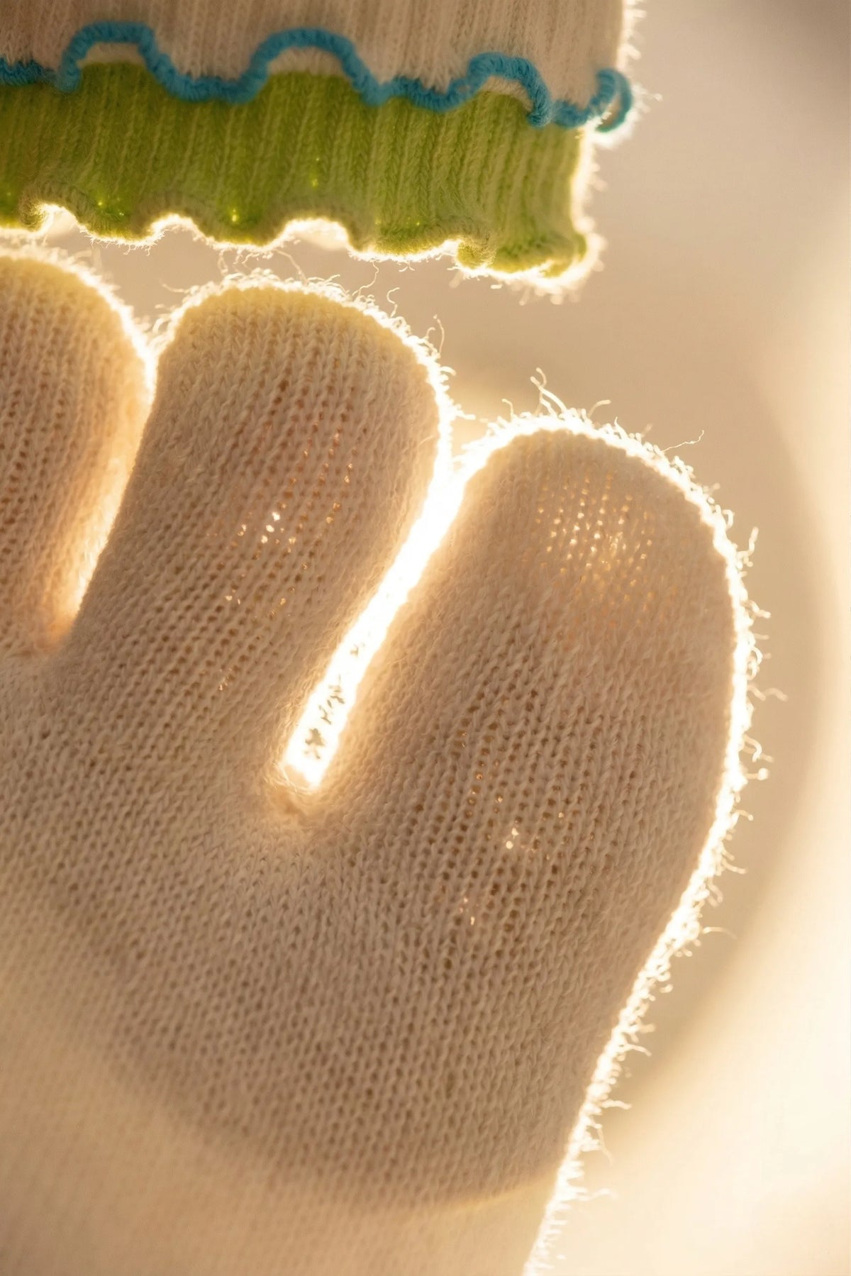 Macro backlit close-up of YG Socks premium combed cotton fabric, highlighting the soft texture, breathable knit, and advanced fiber performance for moisture-wicking and odor protection.