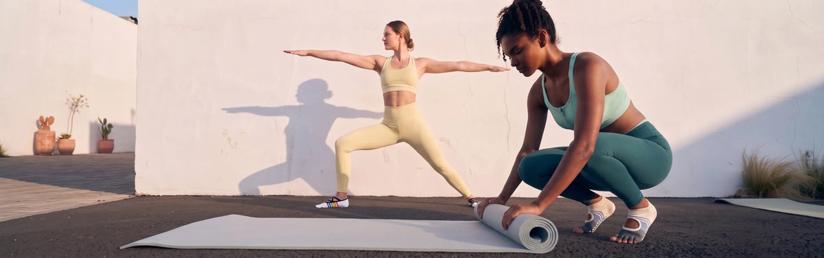 Discover Yanng's story through women practicing yoga in five-toe grip socks outdoors.